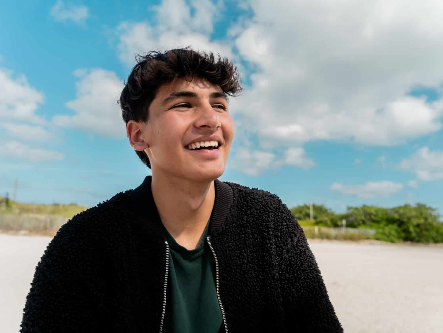 A man with blue sky background