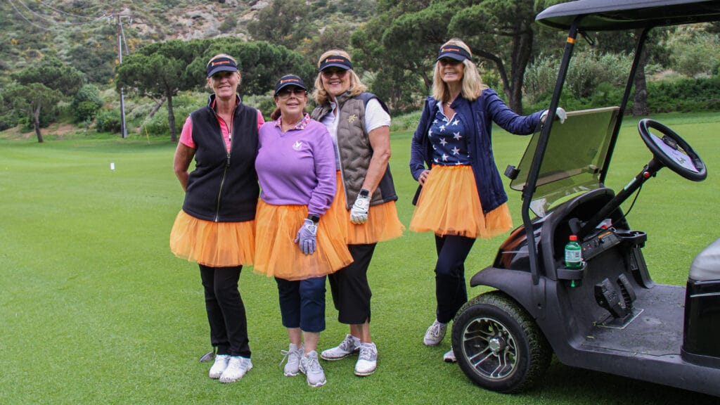Women in Orange tutus playing golf to raise money for Orangewood Foundation