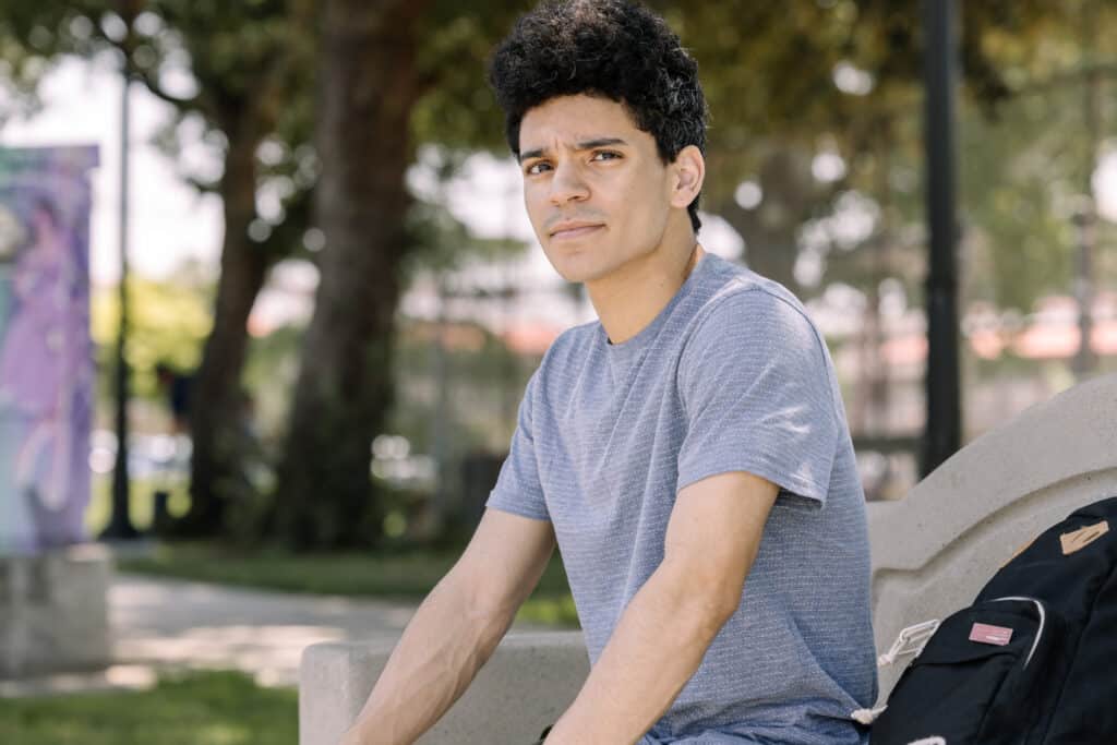 young man on bike facing systemic trauma in foster care