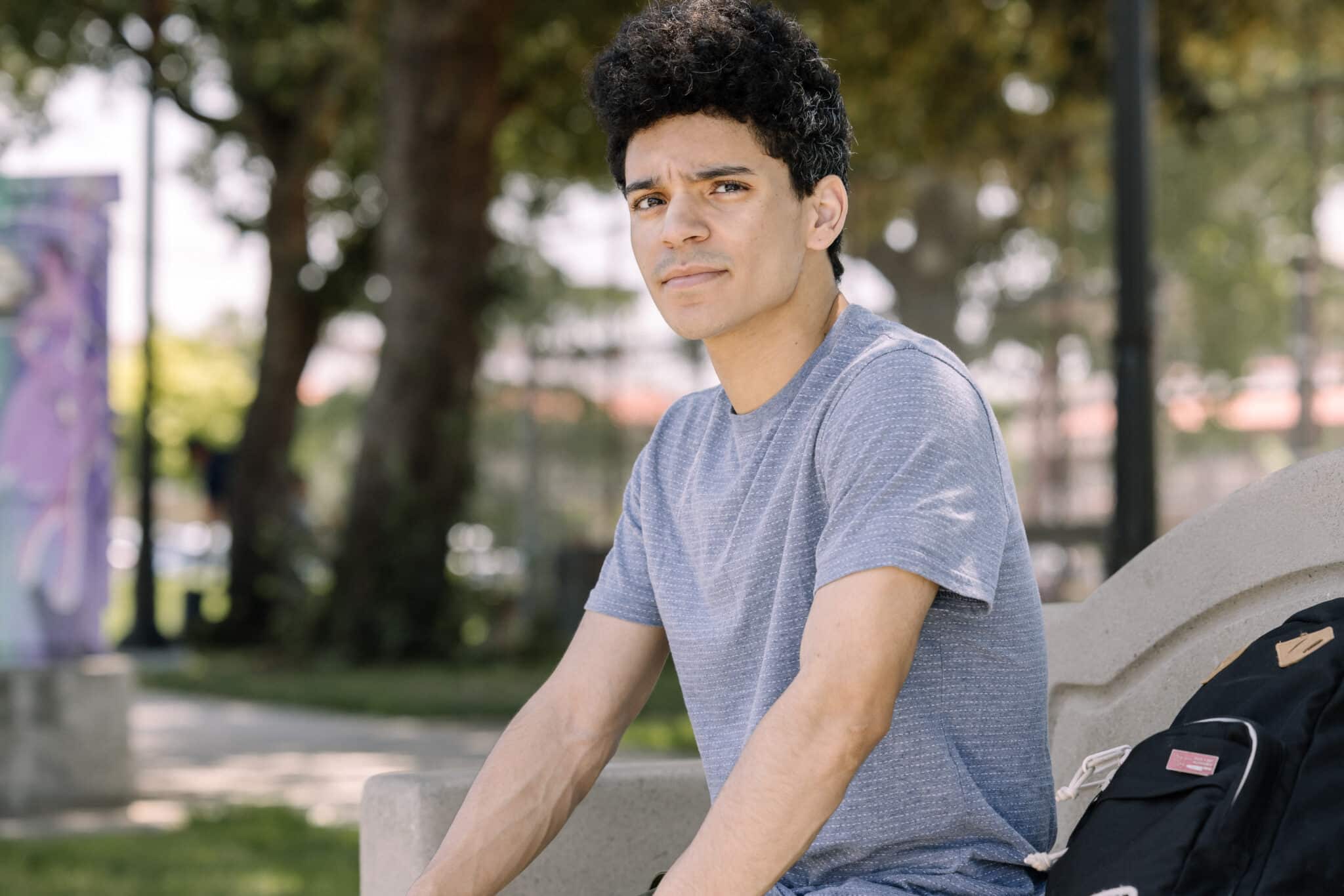 young man on bike facing systemic trauma in foster care