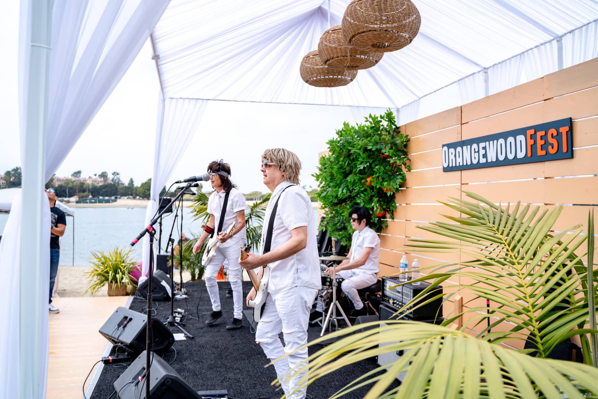 Live band playing at Orangewood Fest and Orangewood Challenge