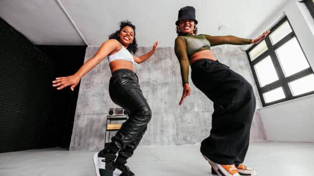 Two black women hip hop dancing