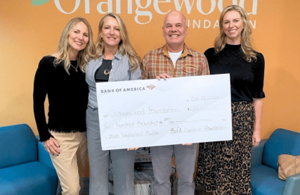 Orangewood Foundation receiving the BofA Neighborhood Builder grant